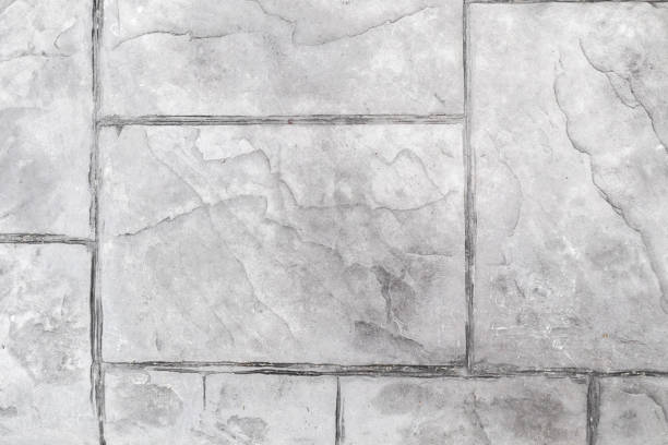 tło tekstury betonowej podłogi stemplowej - sidewalk brick patio floor zdjęcia i obrazy z banku zdjęć