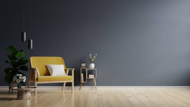 istock Yellow armchair on empty dark wall background. 1325824574