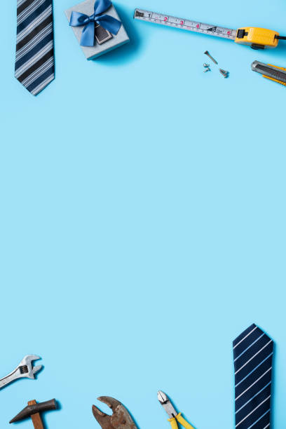 istock Top view design concept of Father's day with working tools on blue background. 1325828661