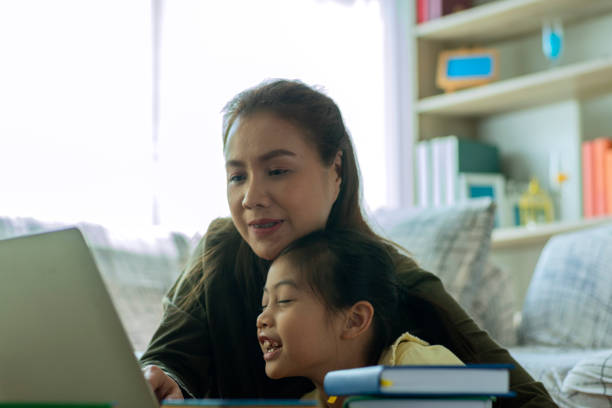 istock An Asian Mother Teaching Her Daughter at Home 1325831472