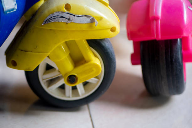 istock mini scooter wheel with pink and blue cover 1325832282