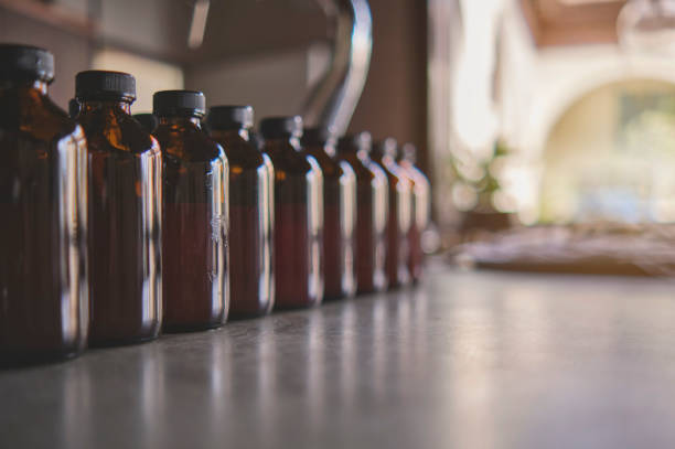 Multiple glass bottles sealed with cork stoppers