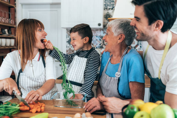 istock Family cooking 1325835127