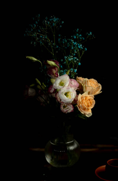 istock retro-style still life: flower and vase, studio shot 1325835781
