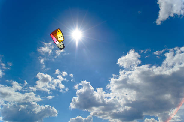 Paraglider flies paraglider in the sky. Paragliding