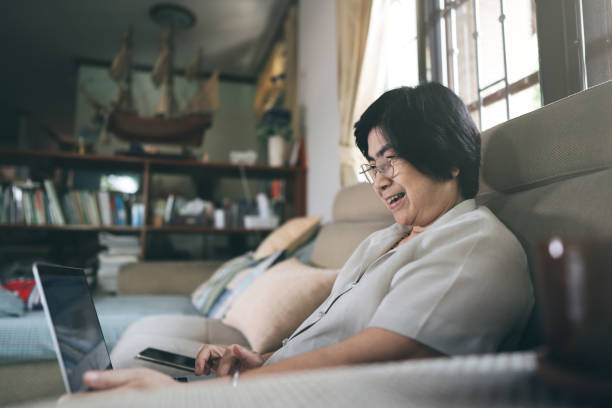 istock Elder hand woman using laptop for online education lesson. 1325837695