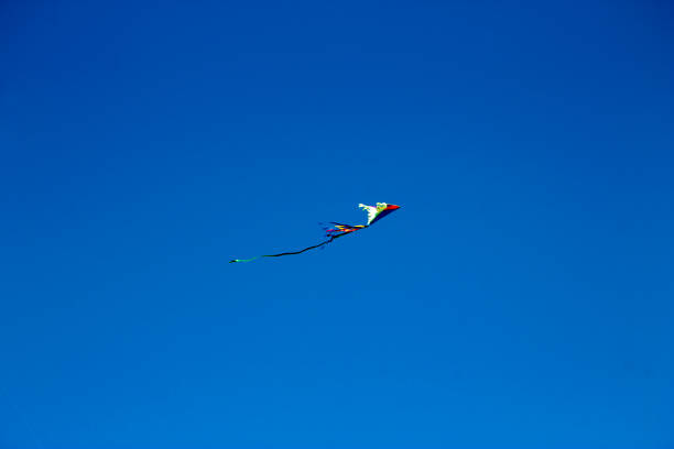 istock A Colorful flying kite fly against blue sky 1325841662