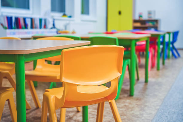 istock Chairs, table and toys. Interior of kindergarten. 1325844889