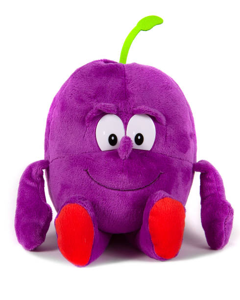istock Children`s toy plum on a white background. 1325847107