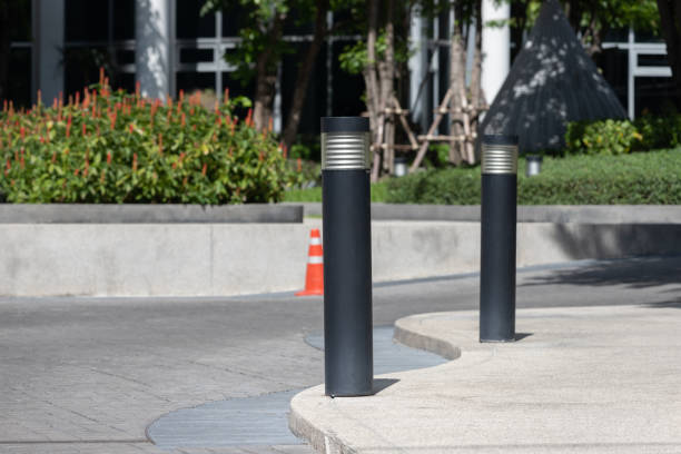 istock black light steel bollards on footpath. 1325850006