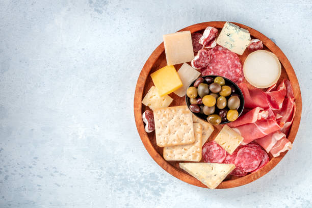 istock Cold meat and cheese board, shot from above with copy space 1325850367