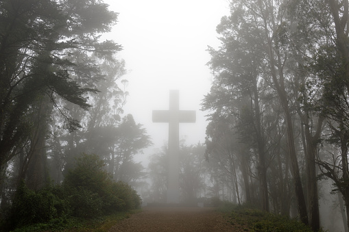 Foggy summer day over the cross at the top of Mt Davidson, the highest point in San Francisco, CA.