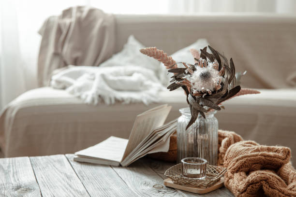 istock Cozy home still life with a book and decorative elements. 1325854016
