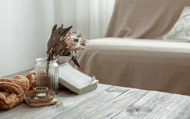 istock Cozy home still life with a book and decorative elements. 1325854017
