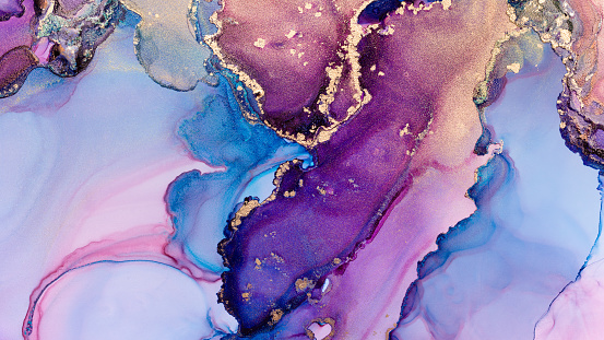 Closeup of multicolored alcohol ink abstract texture, trendy wallpaper. Art for design project as background for invitation or greeting cards, poster, presentation, wrapping paper, banner