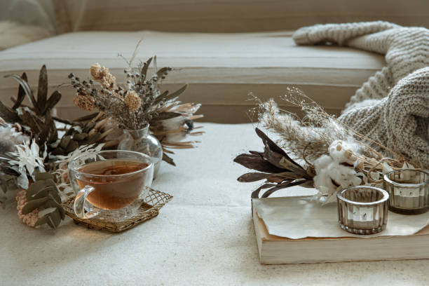 istock Cozy composition with a cup of tea, dried flowers and decorative elements. 1325854219