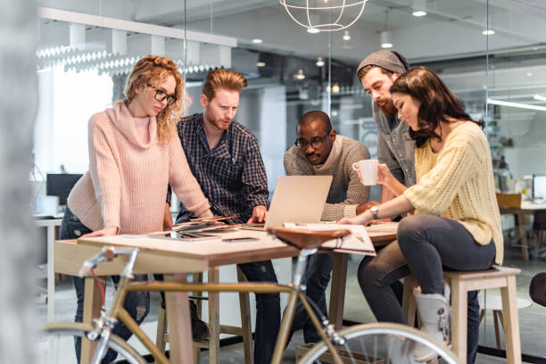 istock Group of freelance workers working on a meeting in the office. 1325855515