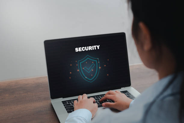 istock Businesswoman working on laptop select icon security in personal data security, Business, technology, internet and networking, cyber data or information privacy concept. 1325858132