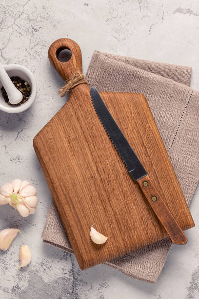 istock cutting board, seasonings on a concrete table 1325858253