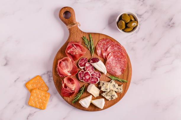 istock Vegetarian, vegan snack - beetroot hummus, sprouted grains, cucumber, and whole grain crisps 1325858541