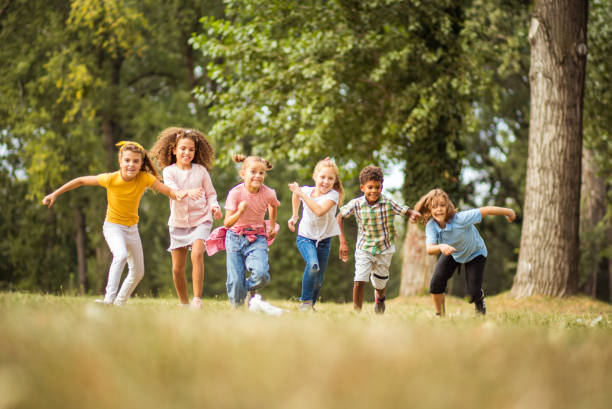istock Group of running kids. 1325863321