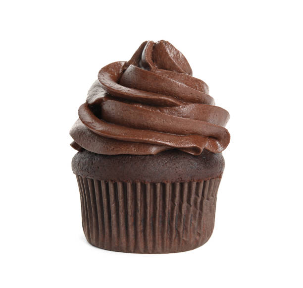 istock Delicious chocolate cupcake with cream isolated on white 1325864941