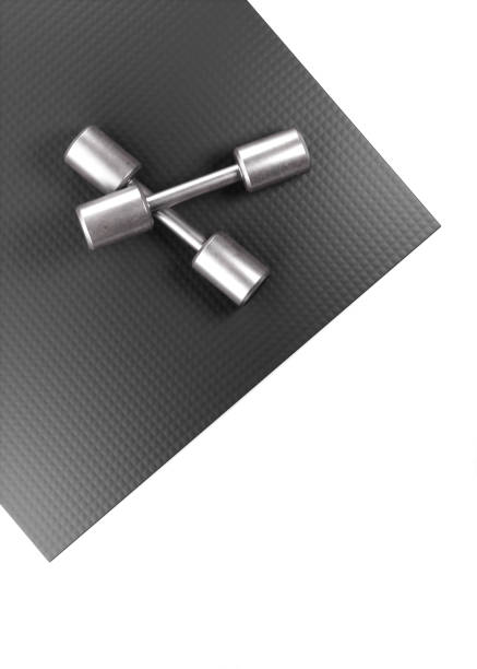 istock Metal dumbbells on white background 1325867254