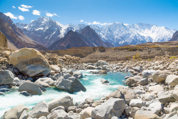 Magical blue-water attabad lake in Gojal, Hunza valley of Pakistan. Magical blue-water attabad lake in Gojal, Hunza valley of Pakistan. karakoram range stock pictures, royalty-free photos & images