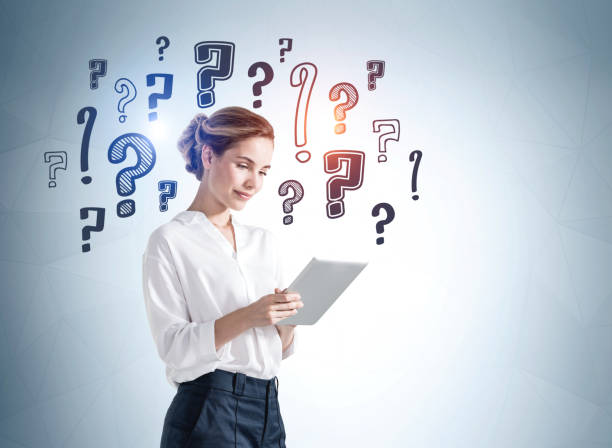 Businesswoman with tablet in hands, question marks sketch