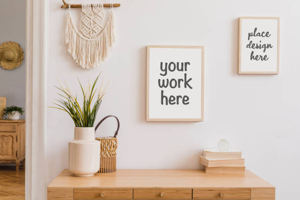 istock Stylish composition of modern hall interior with elements of rustic and boho style with two mock up poster frames. Template. 1325873278