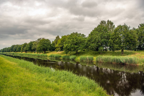 istock Dutch canal on a windless summer day 1325876329