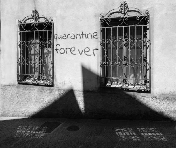 quarantine forever "Quarantine forever" is written on an ancient residential wall, with some sarcasm directed towards COVID policies. *** The text was digitally added and a release is provided *** prison lockdown stock pictures, royalty-free photos & images