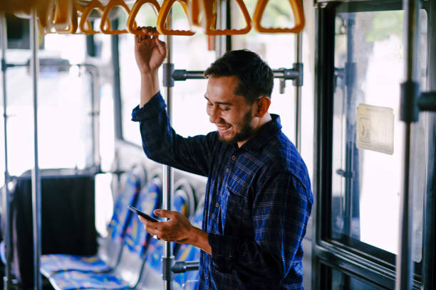istock Young Businessman on The Move - Working from Mobile Phone 1325877382