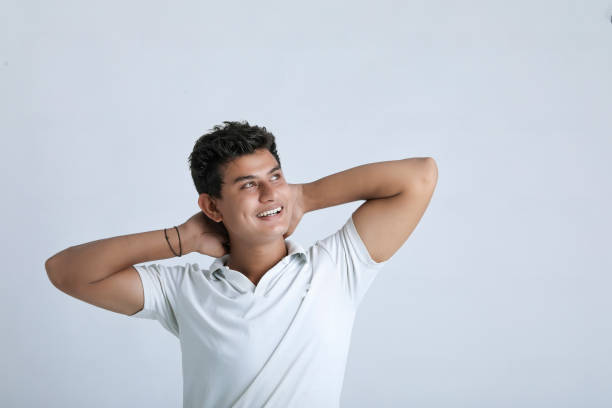 istock Young indian college student showing expression on white background 1325880681