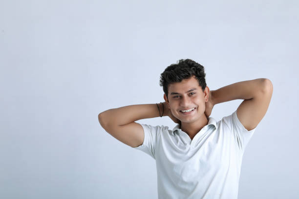 istock Young indian college student showing expression on white background 1325880711