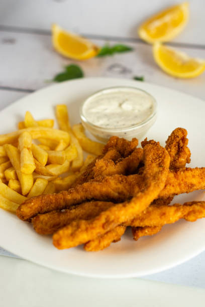 istock Fried chicken sticks whit fries 1325881996
