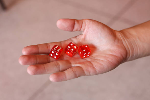 istock Red game dice in flight. Casino gambling 1325882051