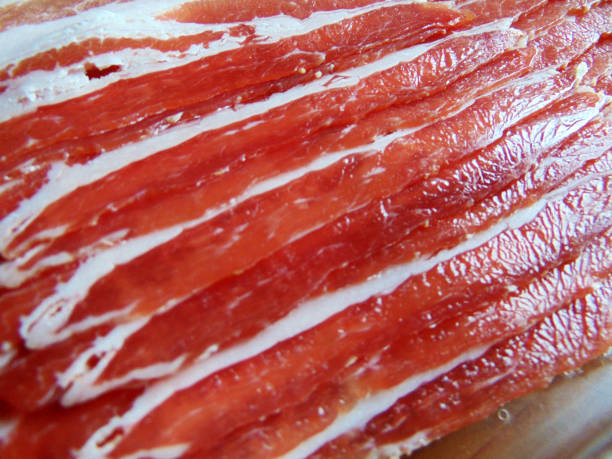 istock slices of bacon - pork meat 1325884654