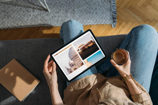 istock Unrecognizable Businesswoman Using Digital Tablet for Planing Business Trip 1325887655