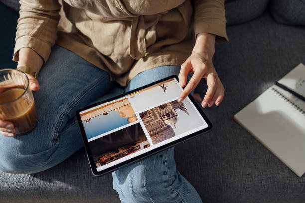 istock An Anonymous Businesswoman Using Digital Tablet for Planing Business Trip 1325887659