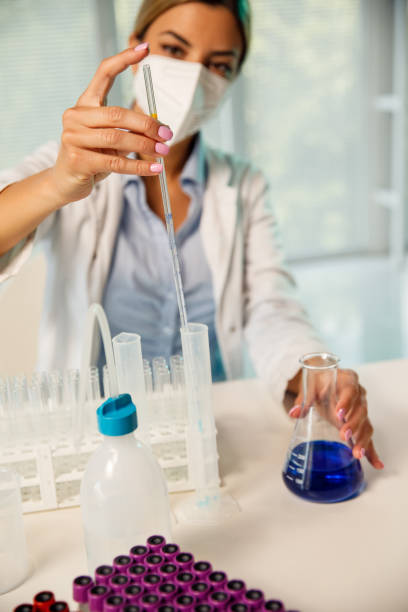 istock Putting a drop of liquid in a granulated cylinder while doing research 1325889583