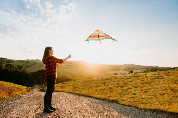 istock A woman flying a kite 1325889719