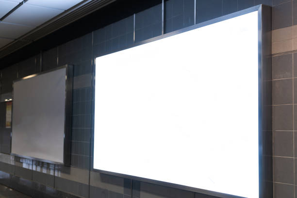 istock Blank billboard mock up signboard frame advertising located in subway underground hall, blurred background layout insert text for customer 1325890132