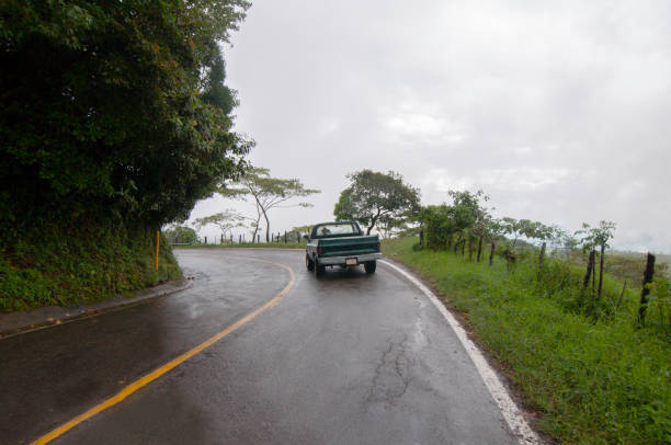 istock foggy road with a van 1325891518