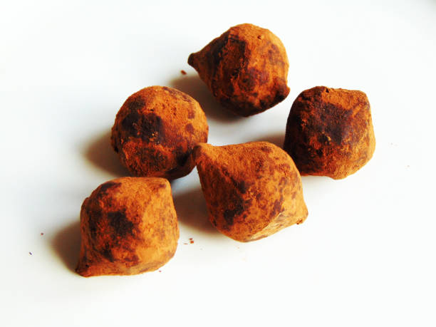 istock vegan truffles with cocoa isolated on white 1325894715