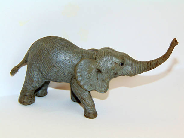 istock elephant toy isolated on white 1325895797