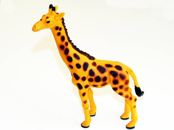 istock giraffe toy isolated on white background 1325895826