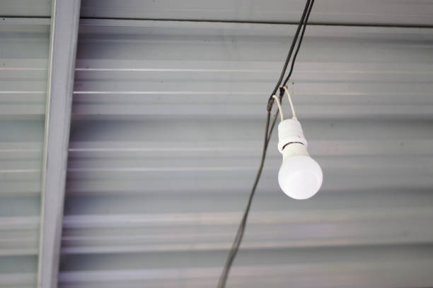 istock Light bulb and roof top minimalist. 1325896212