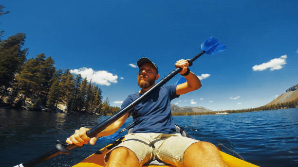istock Summer travel in USA: POV kayaking in lake recreational area 1325896773