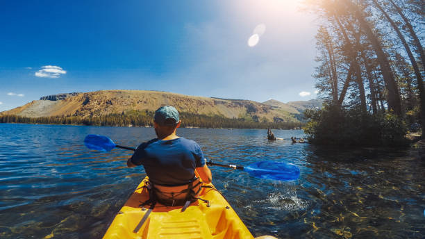 istock Summer travel in USA: POV kayaking in lake recreational area 1325896789